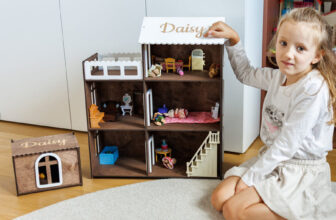 Open-sided wooden dollhouse in a dark walnut finish